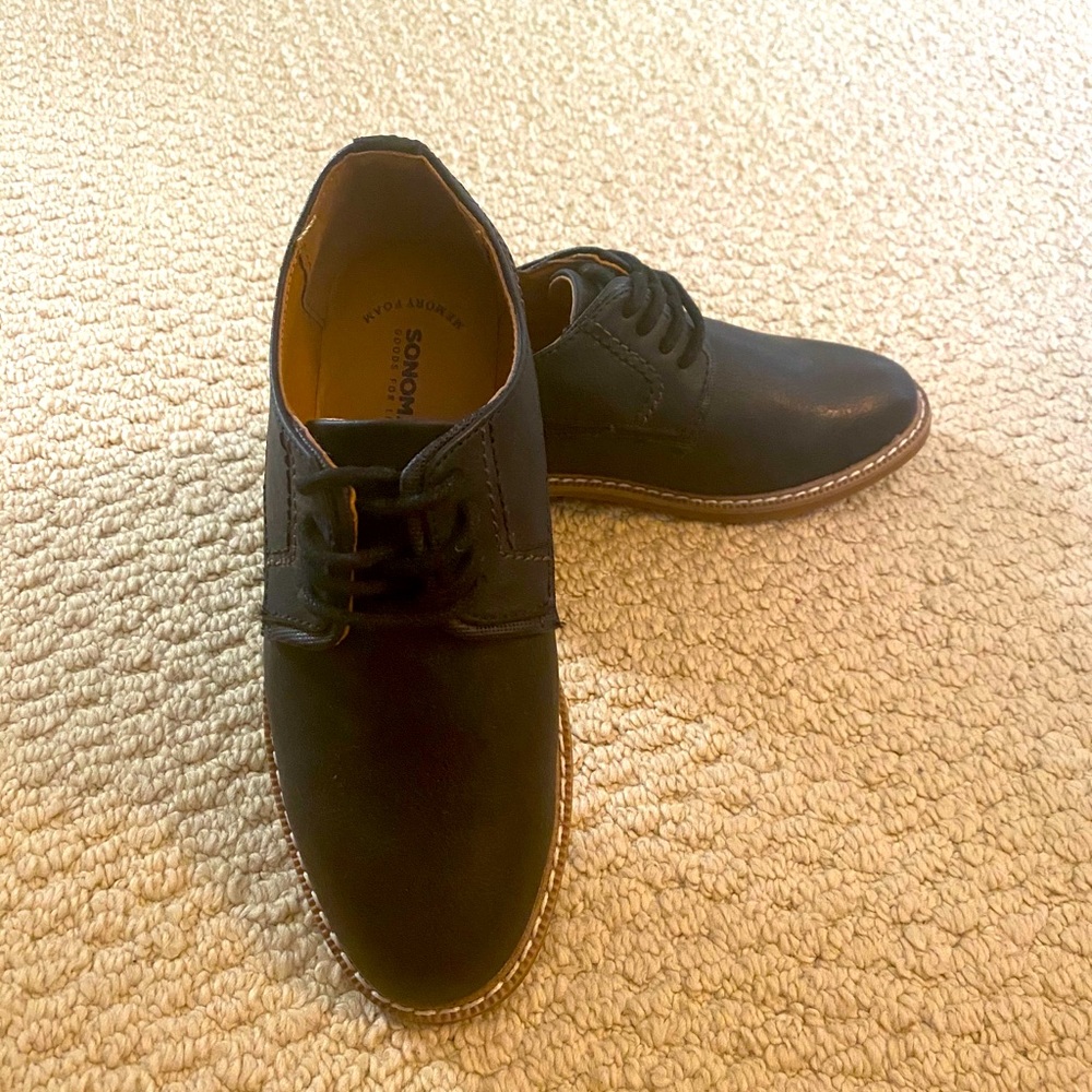 Like kid’s size 1 black dress shoes memory foam!